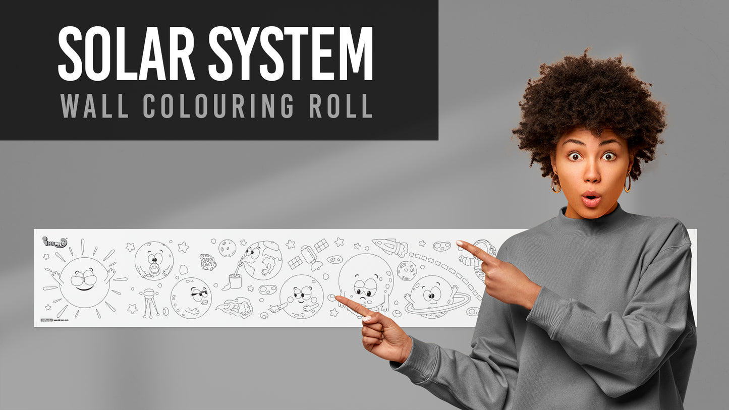 The image shows a women pointing out the solar sytem roll attached to the wall with wonder expression on her face