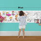 The image depicts a father and his two daughters enjoying a bonding moment while colouring occupation sheet attached to the wall.