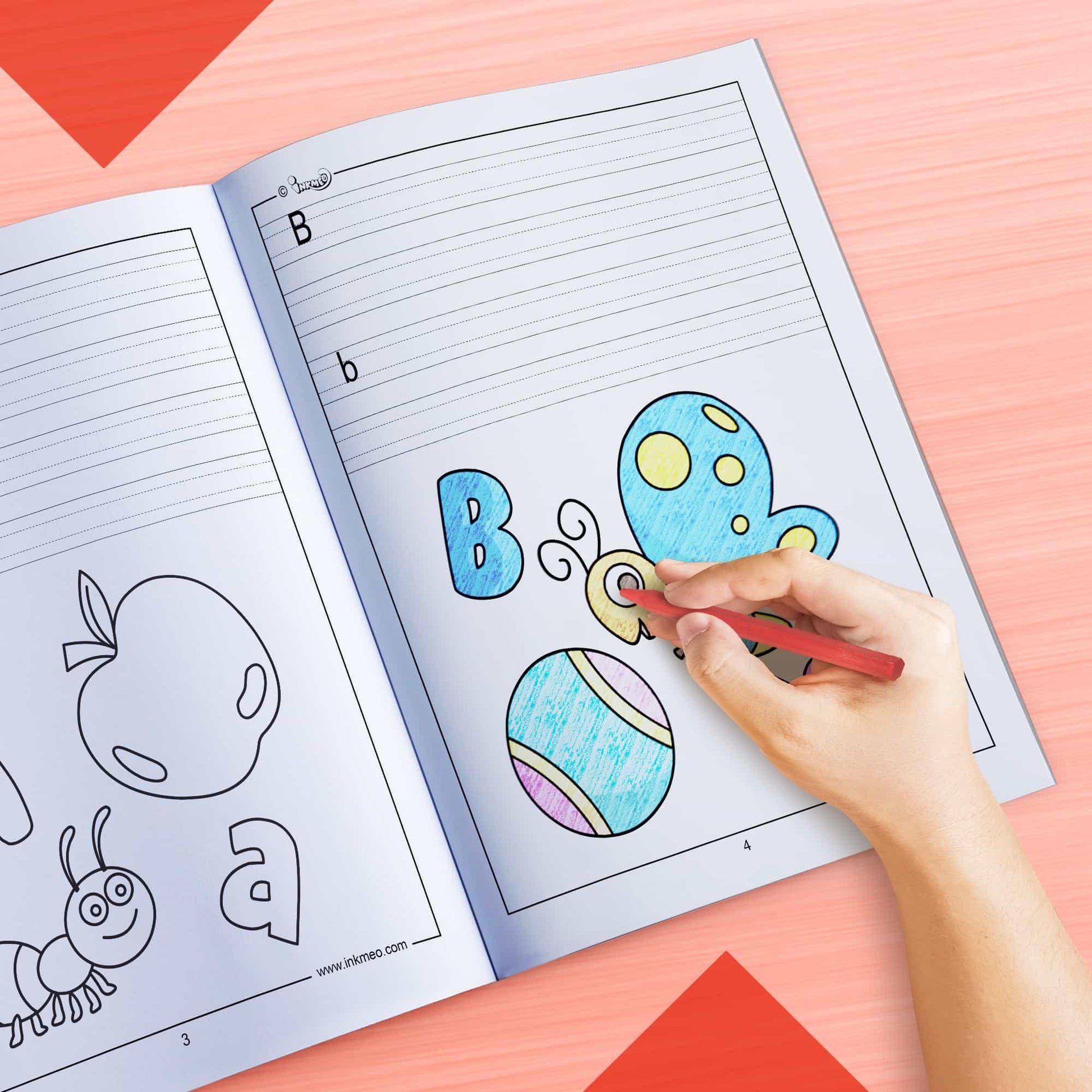 The image depicts a hand coloring a book with crayons.