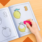 The image depicts a hand using an eraser to erase crayon marks in a colouring book.