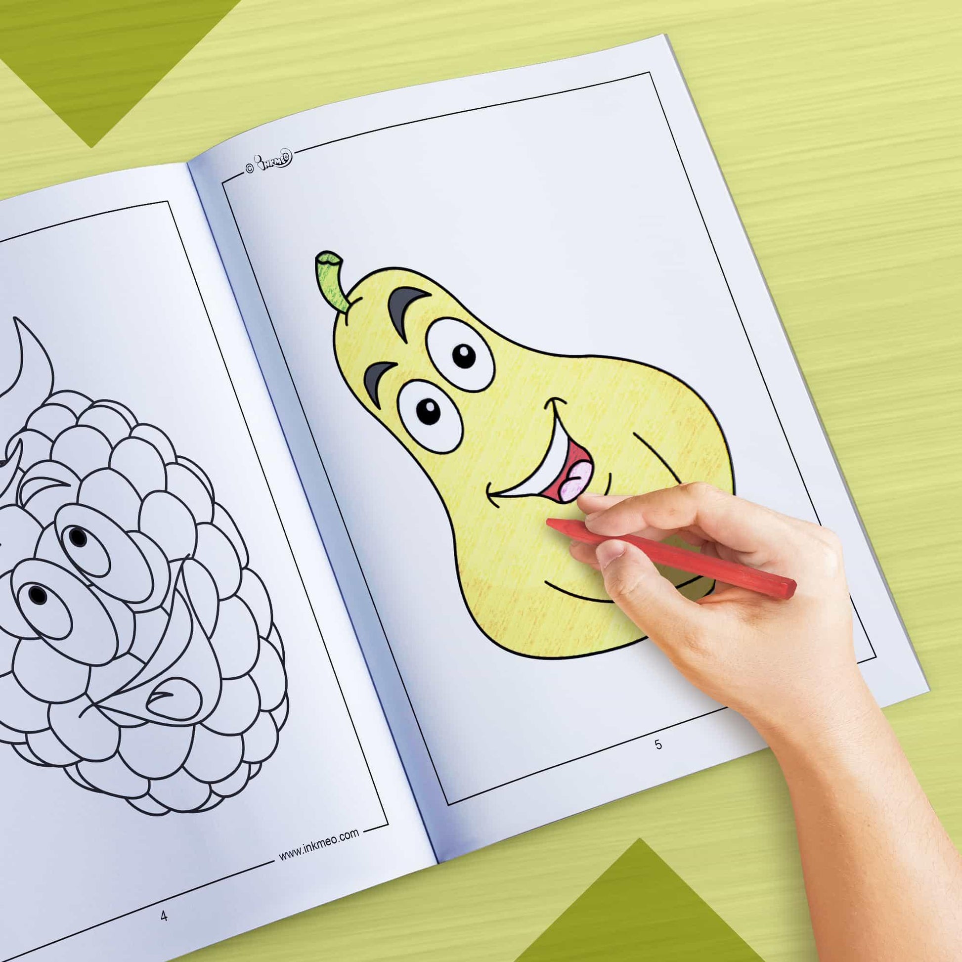 The image depicts a hand coloring a book with crayons.