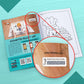The image depicts a green background with an open book placed on it, with an activation code zoomed in from the book.