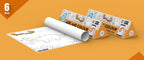 The image depicts two 6*40-inches orange triangular add and colour boxes placed alongside each other, with a sheet rolled out next to them.