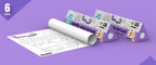 The image depicts two 6*40-inch lavender triangular hindi rhymes boxes placed alongside each other, with a sheet rolled out next to them.