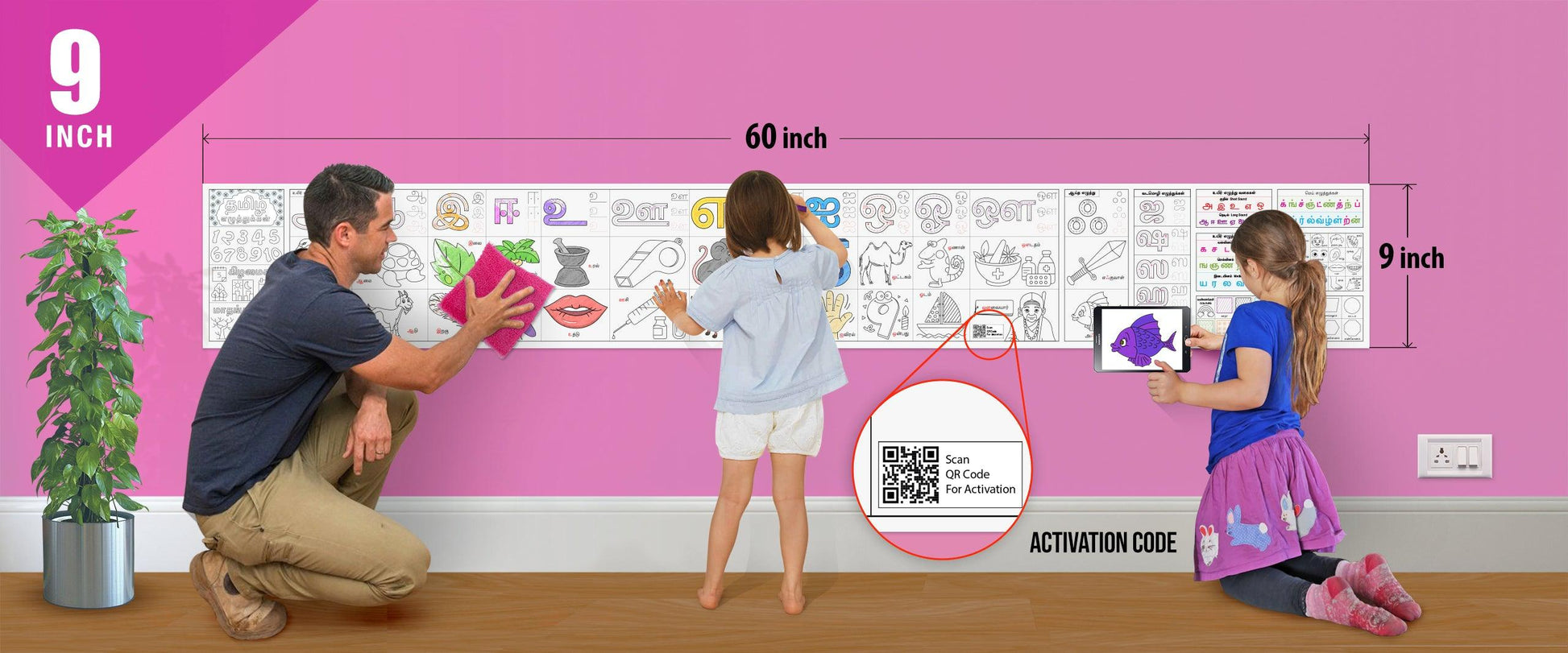 The image depicts a father and his two daughters enjoying a bonding moment while colouring in tamil alphabets roll attached to the wall.